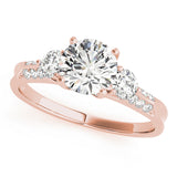 rose gold three stone diamond accented engagement ring
