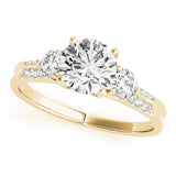 yellow gold three stone diamond accented engagement ring