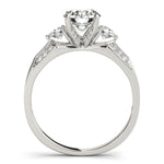 white gold three stone diamond engagement ring with accent diamonds on shank
