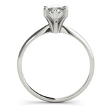 white gold solitaire engagement ring with a marquise diamond