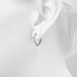 platinum twisted diamond hoop earrings