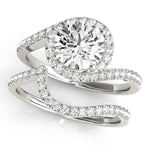 White gold bypass halo diamond engagement ring with white gold curved diamond wedding band