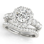 white gold halo diamond engagement ring and white gold diamond wedding band