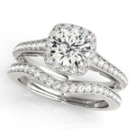 platinum vintage inspired halo engagement ring and platinum curved diamond wedding band