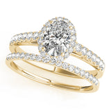 yellow gold oval halo engagement ring and yellow gold single row diamond wedding band