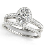 white gold single row diamond wedding band and white gold oval halo engagement ring