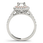 white gold double halo diamond engagement ring with an emerald cut diamond and rose gold accent prongs