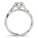 white gold round halo diamond engagement ring with a twisted shank