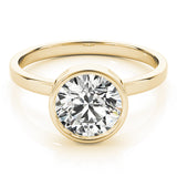 yellow gold bezel set solitaire engagement ring 