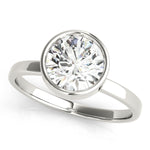 white gold bezel set diamond solitaire engagement ring