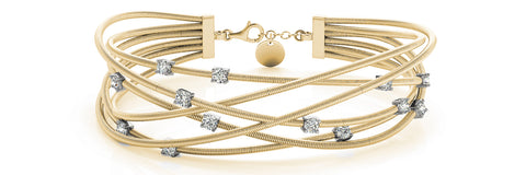 yellow gold flexible criss cross diamond bangle