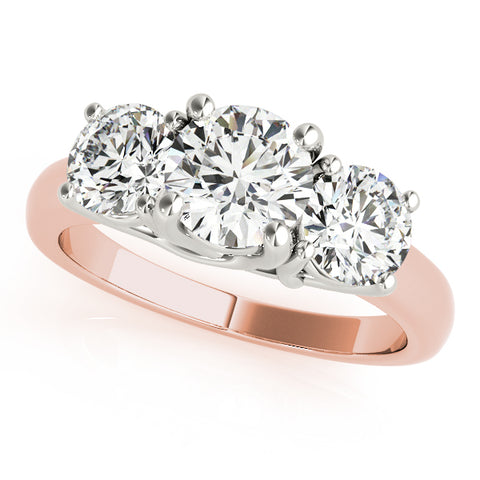 rose gold three stone diamond engagement ring with white gold prongs