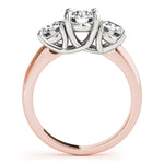 rose gold three stone diamond engagement ring with white gold prongs