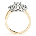 yellow gold three stone diamond engagement ring with white gold prongs