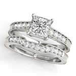 white gold vintage inspired curved diamond wedding band and white gold vintage inspired princess cut engagement ring