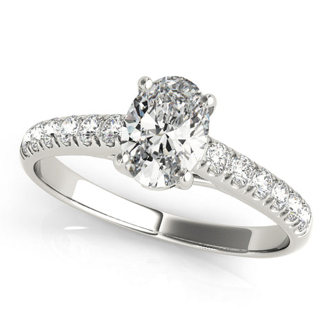 platinum single row diamond engagement ring with an oval diamond