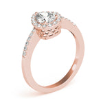 rose gold pear shaped diamond halo engagement ring