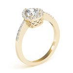 yellow gold pear shaped diamond halo engagement ring