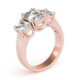 rose gold three stone emerald cut engagement ring