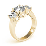 yellow gold three stone emerald cut engagement ring 