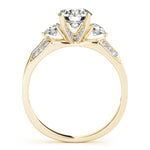 yellow gold three stone diamond accented engagement ring 