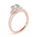 rose gold three stone diamond accented engagement ring