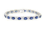 white gold blue sapphire and diamond tennis bracelet