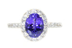 white gold tanzanite and diamond halo ring