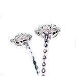 14kt white gold diamond floral bypass ring