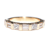 14kt yellow gold diamond ring, alternating baguette diamonds and princess cut diamonds