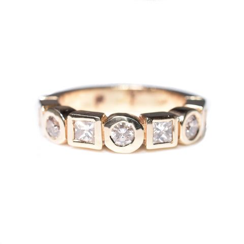 14kt yellow gold bezel-set diamond ring, alternating princess cut diamonds and round brilliant diamonds