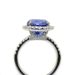 14kt white gold tanzanite and diamond halo ring