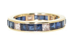 yellow gold blue sapphire and diamond eternity ring