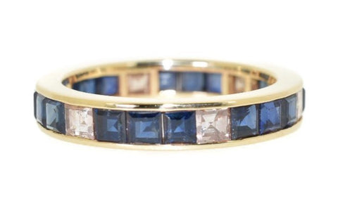 yellow gold blue sapphire and diamond eternity ring