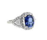 white gold blue sapphire and diamond ring