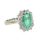 colombian emerald and diamond ring in white gold