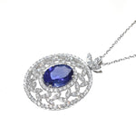 White Gold Tanzanite & Diamond Pendant