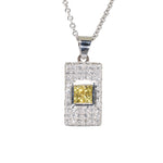 white gold diamond and yellow sapphire pendant