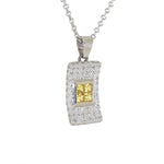 white gold diamond and yellow sapphire pendant