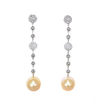 white gold diamond and gold south sea pearl long drop earrings