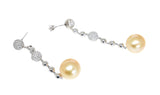 white gold diamond and gold south sea pearl long drop earrings