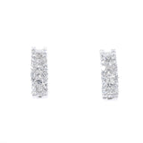 white gold diamond huggie earrings