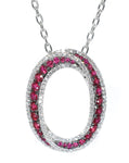 white gold ruby and diamond oval pendant