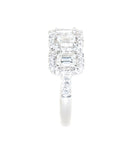 white gold emerald cut and round brilliant diamond rings