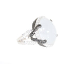 white gold moonstone ring with black and white diamonds