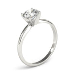 white gold solitaire engagement ring with round diamond