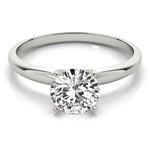 white gold solitaire engagement ring with round diamond
