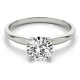 white gold solitaire engagement ring with round diamond