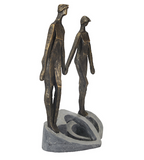 bronze couple holding hands sculpture
