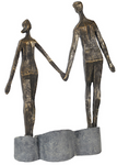 bronze couple holding hands sculpture